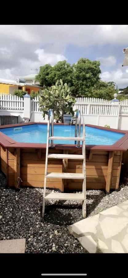 Le Sable Bleu - Evasion Tropicale A Sainte-Anne - Plage 5Min - Piscine - Parking - Logement Climatise - Vue Sur Les Palmiers - Parfait Pour Sejours En Famille Ou Entre Amis Dış mekan fotoğraf